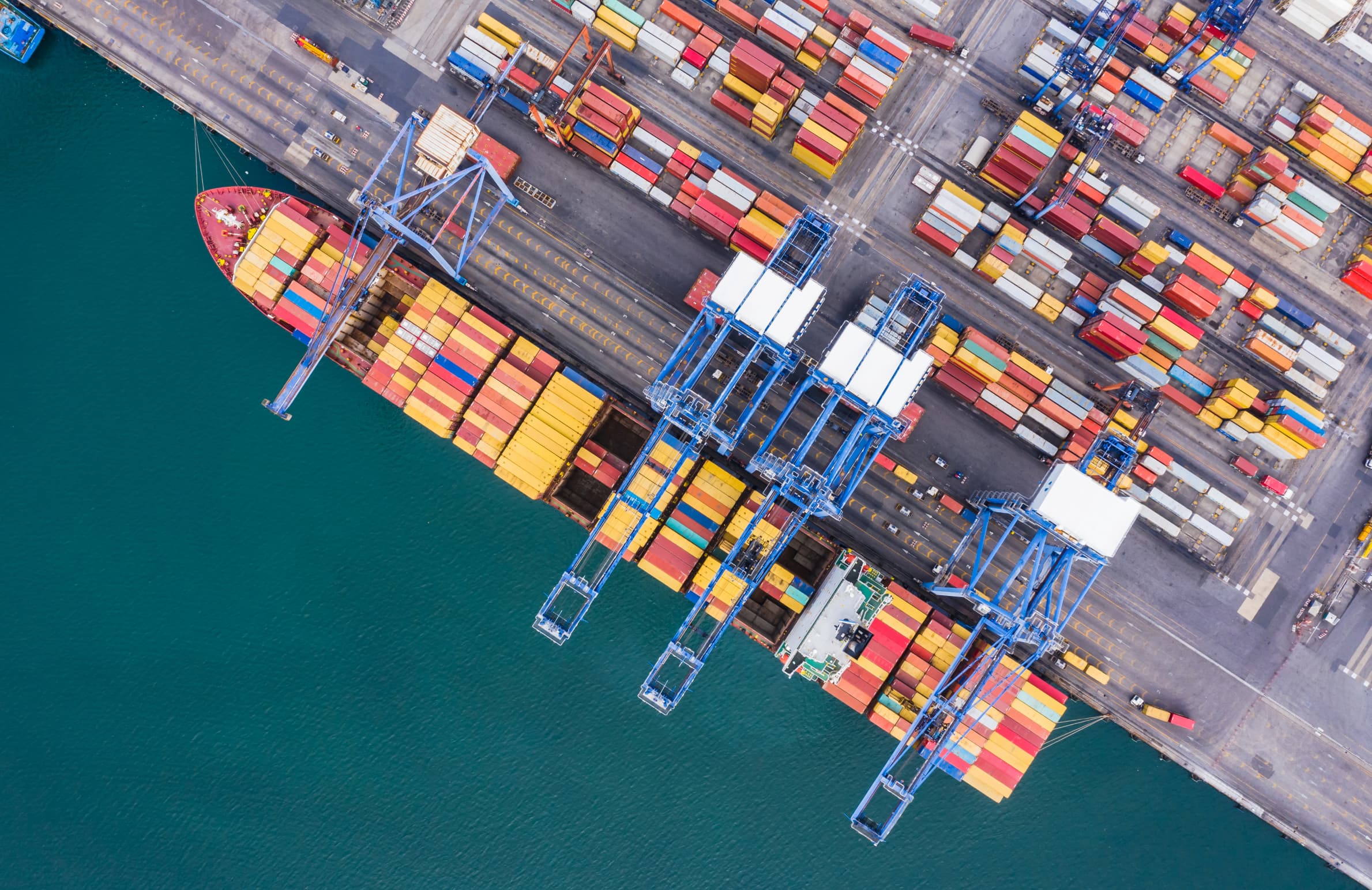 shipping-port-logistics-cargo-transportation-import-export-international-open-sea 1 (2) (1)
